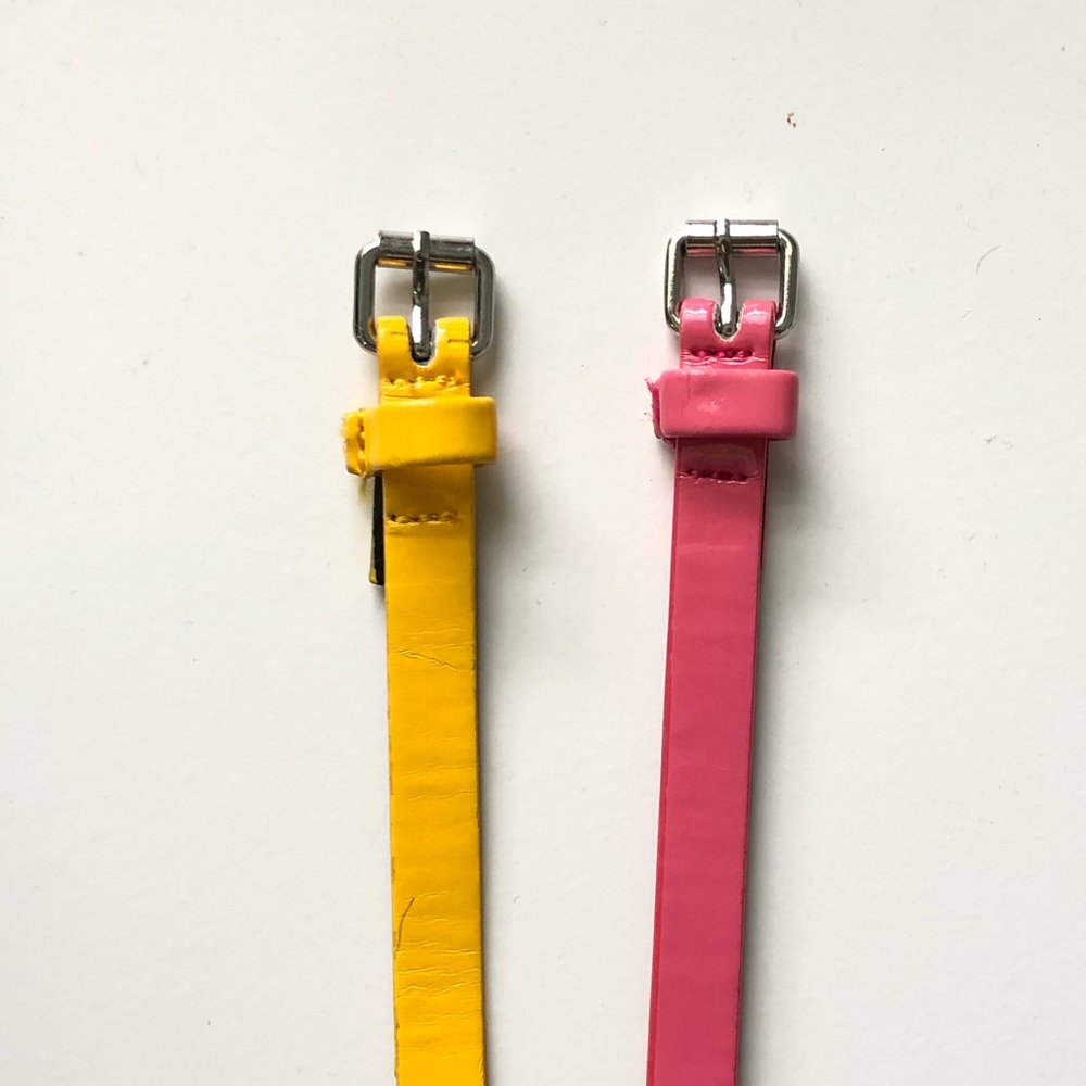 H&M set of 2 skinny belts in yellow and pink